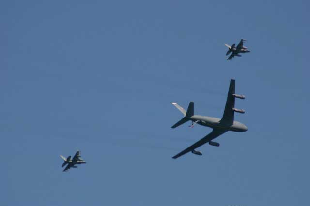 Military refueling KC-135 and fighter jets